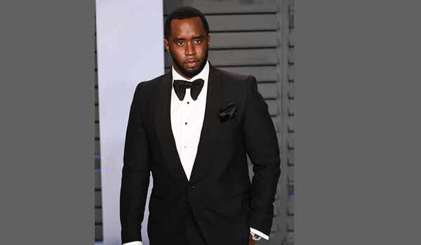 Aman waering a suit.